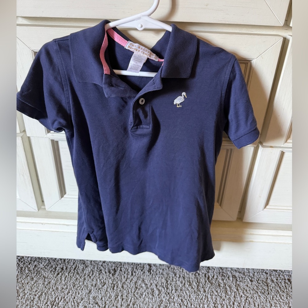 The Beaufort Bonnet Company Navy Polo with Pink Trim and Embroidered Bird